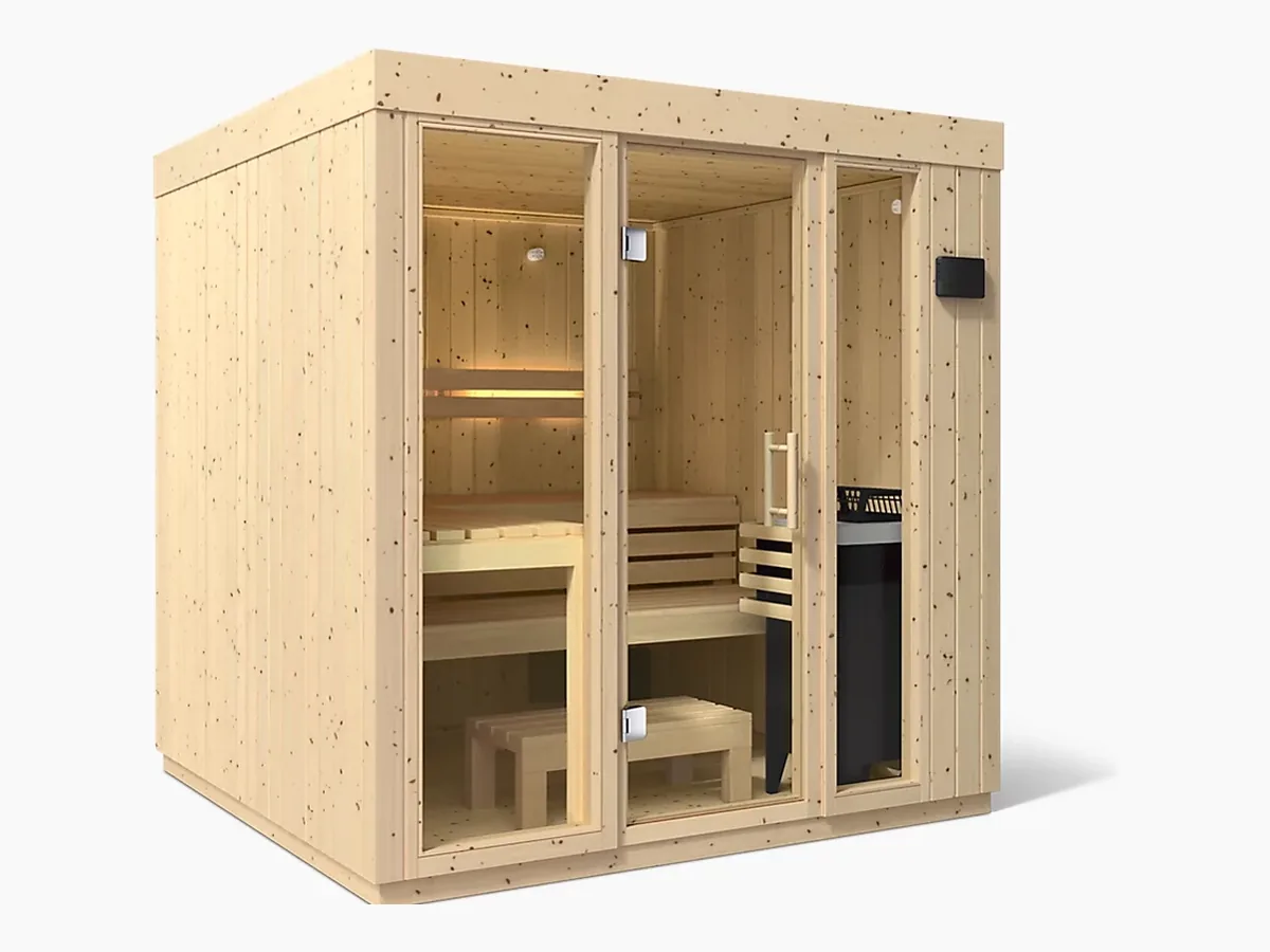 Kohler C1 five-person indoor sauna in Scandinavian spruce with a glass front showing the benches and FERO heater, three-quarter view