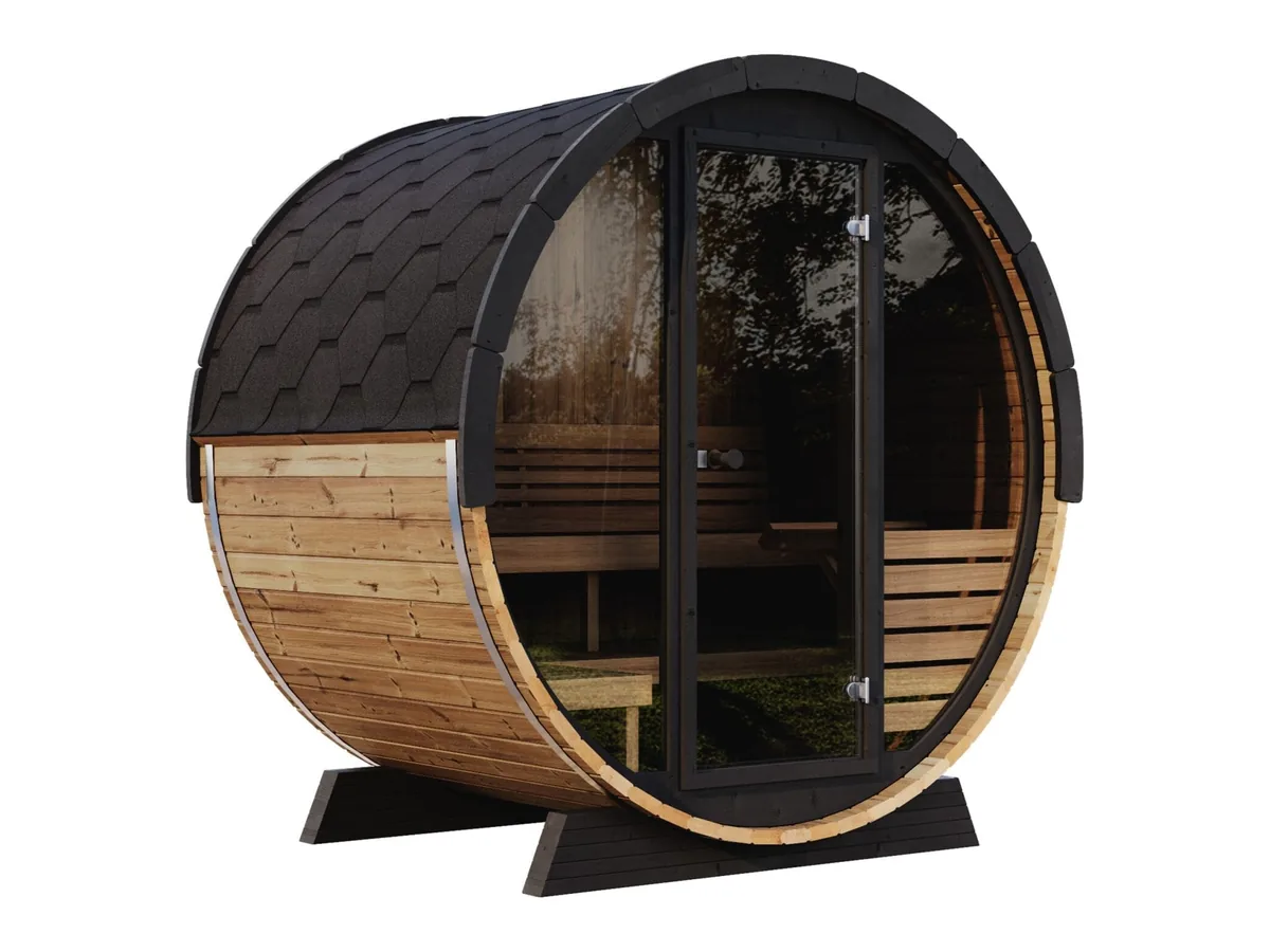 SaunaLife EE6G barrel sauna with its full glass front, bronze glass door and black shingle roof, three-quarter view